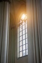 A large gothic window among the columns