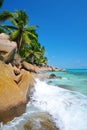 Large granite boulders in Anse Patates beach, La Digue Island, Indian ocean, Seychelles. Beautiful tropical landscape with sunny s Royalty Free Stock Photo