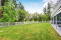 Large grass filled back yard. Royalty Free Stock Photo