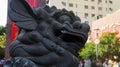 large gray chinese lion statue