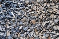 Large gray granite gravel background. Rubble as a background. Building stone