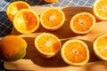 Large greek oranges, halved and ready to be squeezed for some golden, delicious juice