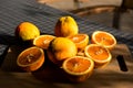 Large greek oranges, halved and ready to be squeezed for some golden, delicious juice