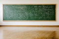 A large green chalkboard with equations and formulas written on it Royalty Free Stock Photo