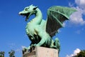 Large green Dragon bridge statue in Ljubljana, Slovenia Royalty Free Stock Photo