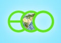 Large green letters spelling ECO closeup and globe illustration in the centre of picture. Elements this image are Royalty Free Stock Photo