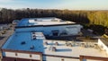 Large grocery store and strip mall with rooftop units for all in one HVAC solution in Flowery Branch, Georgia, USA