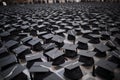 A large group of black graduation caps AI generation