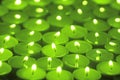 Large group of burning green tea lights Royalty Free Stock Photo