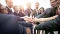 large group of business people standing with folded hands togeth Royalty Free Stock Photo