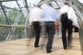 Large group of business people walking through the tunnel in office Royalty Free Stock Photo