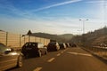 Cars driving fast on country road