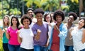 Large group of cheering african american and caucasian and hispanic and latin young adults Royalty Free Stock Photo