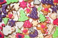 Large group of delicious, homemade Christmas honey cookies with fondant in many different shapes and colors Royalty Free Stock Photo