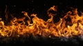 A large group of fire flames against a black background Royalty Free Stock Photo