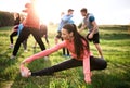 Large group of fit and active people doing exercise in nature, stretching. Royalty Free Stock Photo