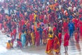 Large group of Hindu people in red clothes