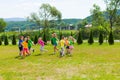 Large group of kids play outdoor games Royalty Free Stock Photo