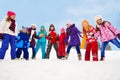 Large group of kids together on snow day Royalty Free Stock Photo