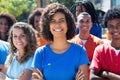 Large group of laughing african woman and caucasian and latin am