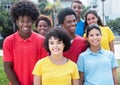 Large group of laughing multiethnic young adults Royalty Free Stock Photo