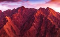 Large group of peoplaScenic view of Hatta Hajar Mountae form to create the number 100 or Hundred in Arabic. People font or Number.