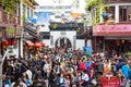Large Group of People on a Crowded Street in Zhujiajiao, Qingpu District of Shanghai China April 04, 2017