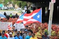 Large group of people marching to protest against the Privatization of Public-Sector Services