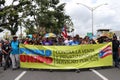 Large group of people marching to protest against the Privatization of Public-Sector Services