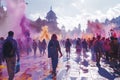 A large group of people walking down a street during the Holi Festival of Colors, celebrating and parading together Royalty Free Stock Photo