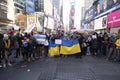 A large group of peopleat a protest to support Ukraine