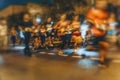 Large group of running athletes on street, night city marathon, blur effect, unrecognizable peole. Sport, fitness, lifestyle