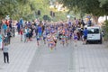 Large group of running girls and boys in blue