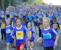 Large group of running girls and boys