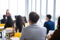 Large group in seminar class room to agree with speaker at conference seminar meeting room.