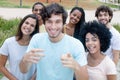 Large group of smiling young men and women from all over the world Royalty Free Stock Photo