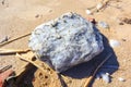 large gypsum stone on the sand Royalty Free Stock Photo