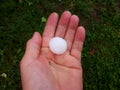 A large hailstone in your hand after a summer hurricane Royalty Free Stock Photo