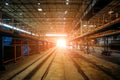 Large hall of warehouse with railroad for freight train load