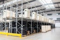 Large hangar warehouse of industrial and logistics companies. Long shelves with a variety of boxes. industry space and hardware