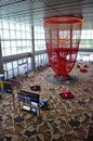 Large hanging art installation at departure gate Singapore Changi airport