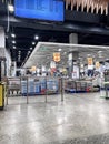 a large hardware store, tools and material. interior of home improvement retailer, racks of door hardware, weather proofing and Royalty Free Stock Photo