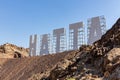 Large Hatta sign in the Hajar Mountains, Hollywood style letters at the top of the hill, United Arab Emirates