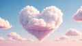Heartshaped Cloud in Blue Sky with Soft Pink Clouds Royalty Free Stock Photo
