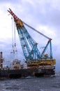 Large Heavy lift crane in operation in North Sea.