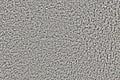 Large high pile of gray carpet, background close-up