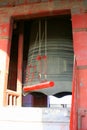 Large historic bronze bell and striker