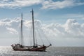 Large historic sailing ships on the Wadden Sea, group travel, seal tour