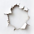 large hole in a white wall with cracks and blank space on the inside Royalty Free Stock Photo