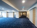 Large hotel hall corridor with long corridor